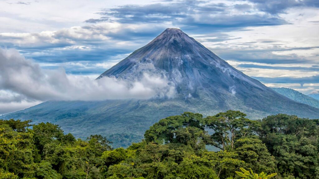 The Arenal Volcano towers over the tropical rainforest in northern Costa Rica.